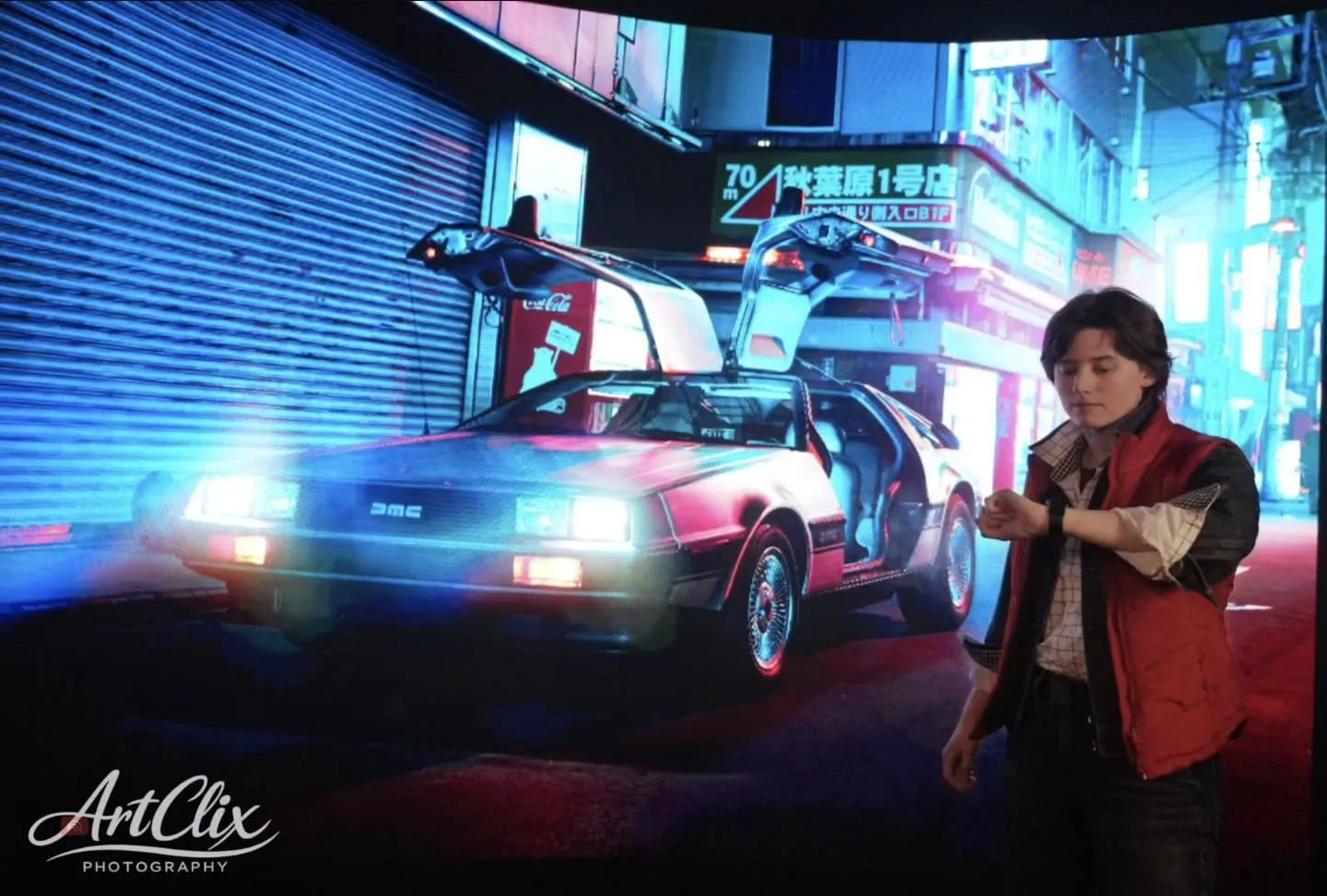 Paliburrito posing in front of a DeLorean and neon city imagery