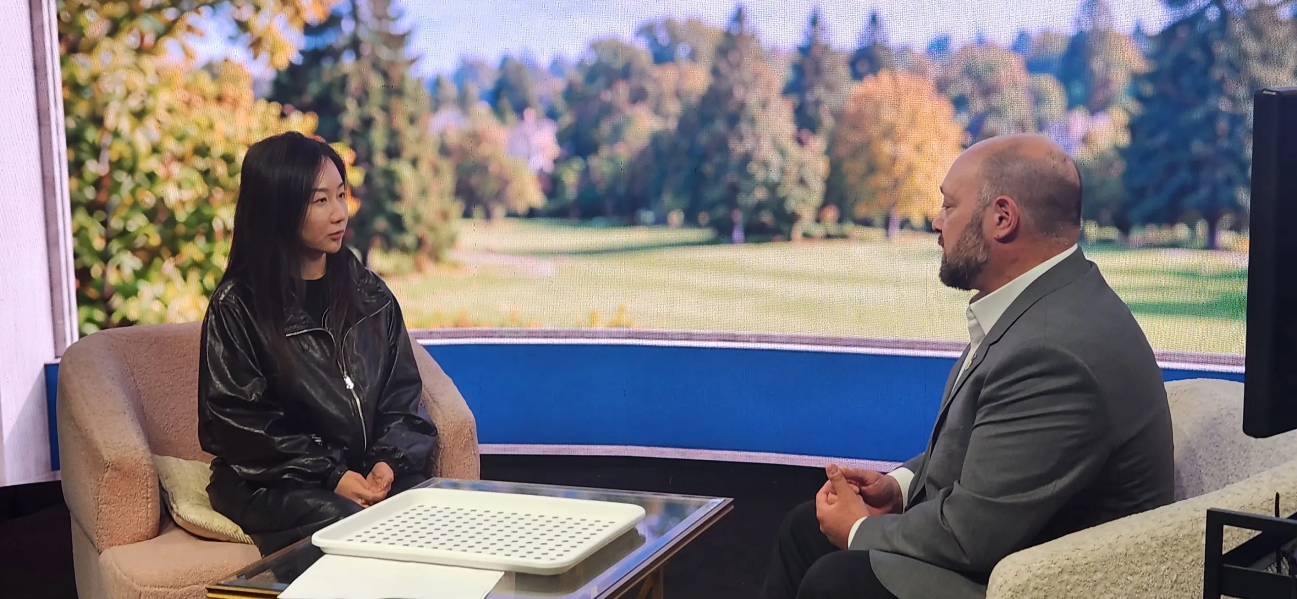 Host and guest during the seated interview recording