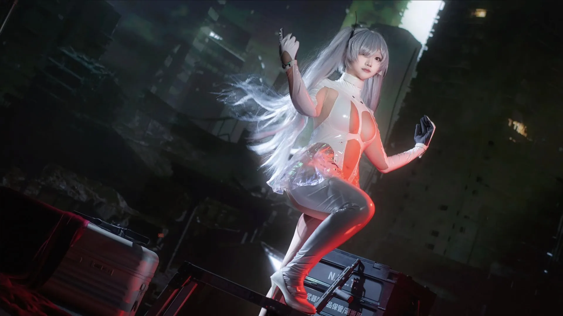 Lilias as Cinderella with white hair and a red-and-black costume in a dark industrial scene