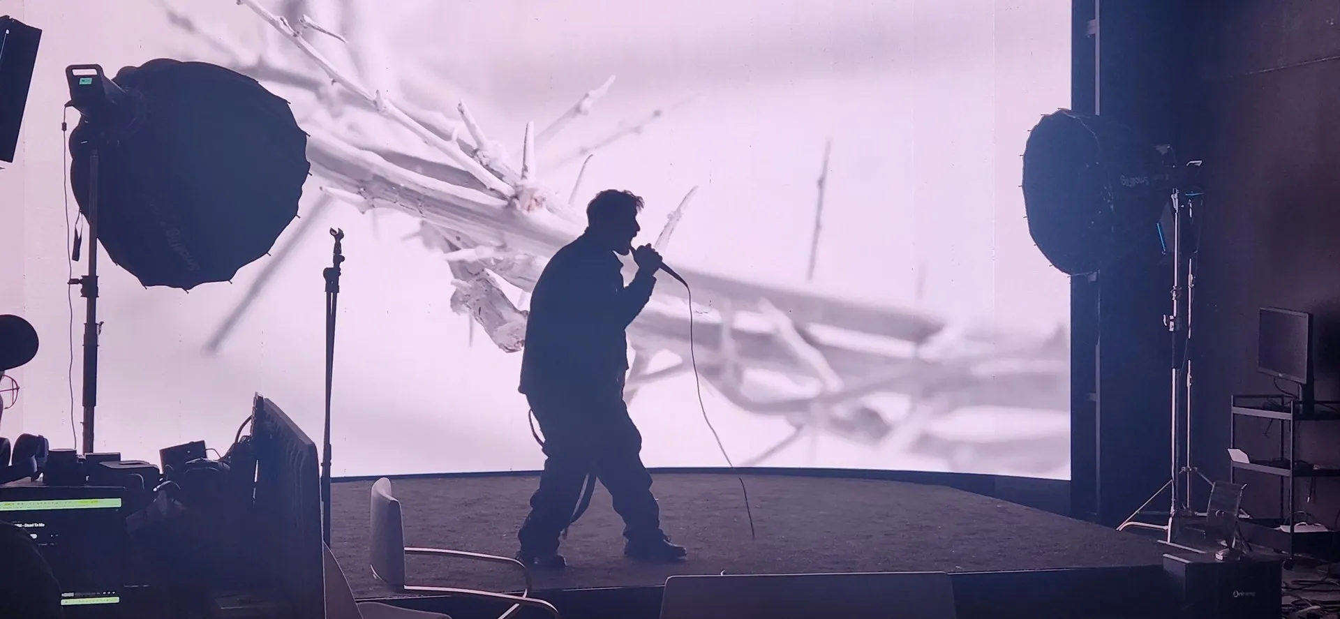 Movement in the performance silhouette against the LED wall
