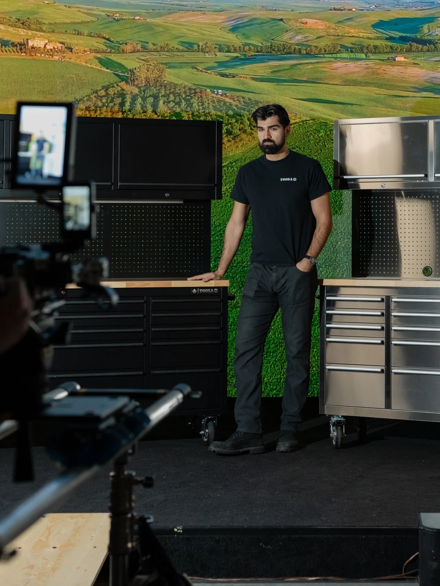 TOOSA product setup with a colourful landscape LED backdrop