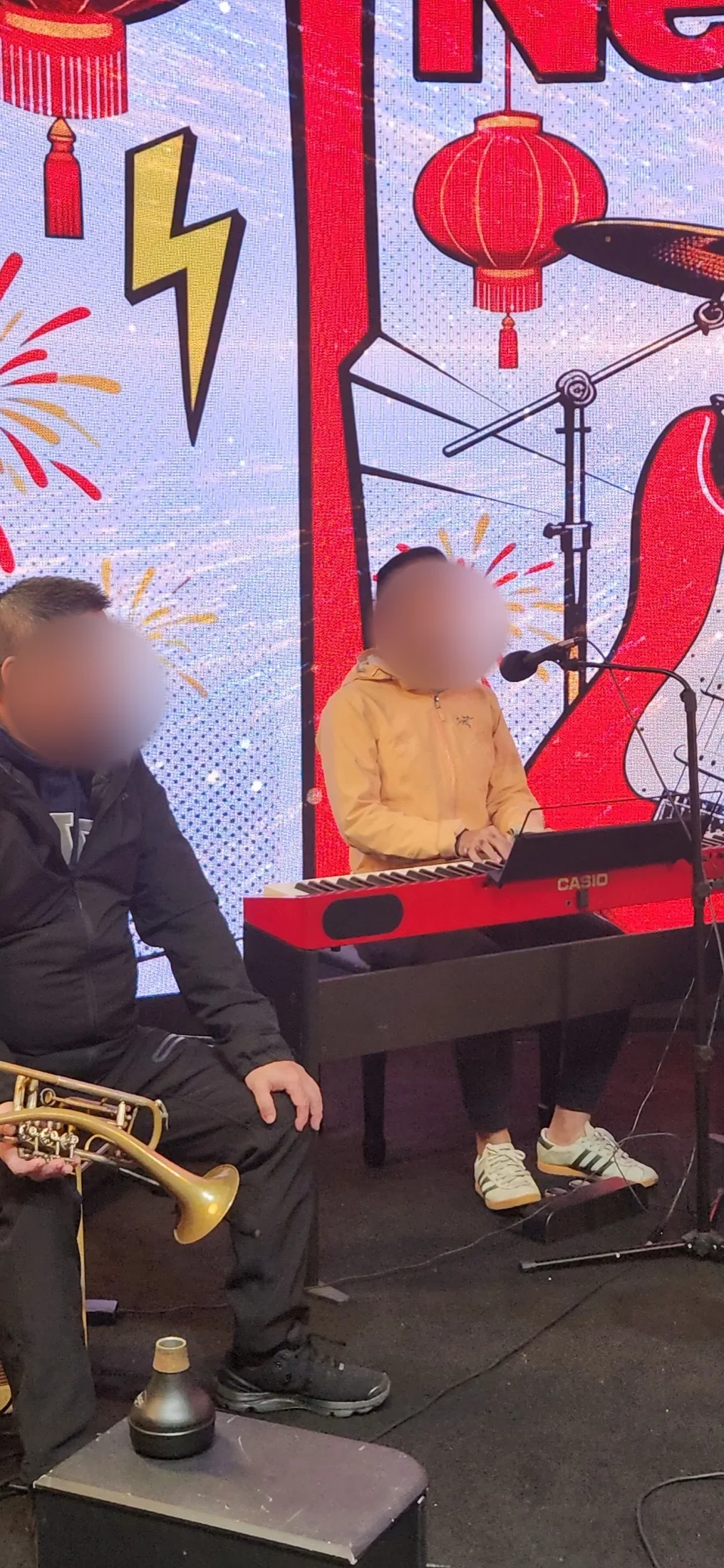 Keyboardist and trumpet player performing at the New Year concert
