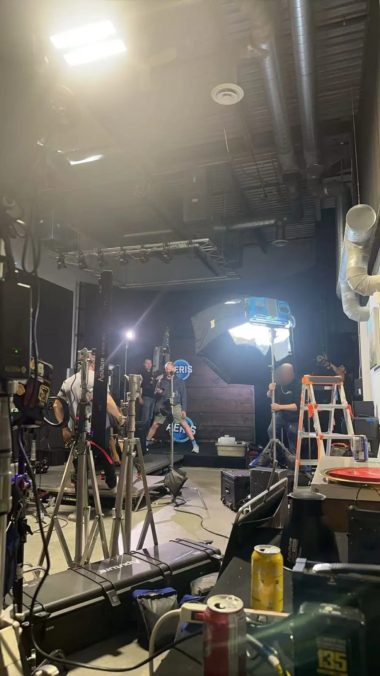 Wooden AERIS Arctic Environment set with studio lighting during the Flyover Canada production