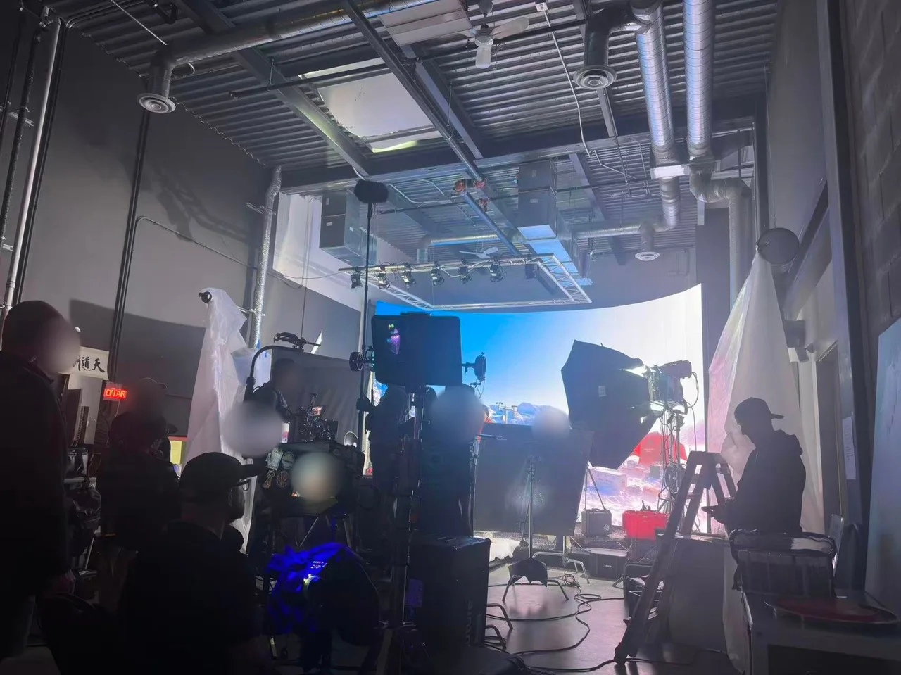 Wide view of the Arctic snow-mountain LED set, crew and camera monitors during the Flyover Canada shoot