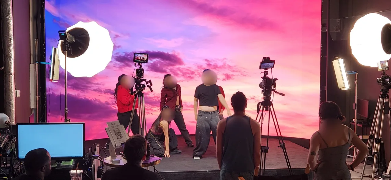 Dance recording with a sunset LED background · studio production photograph 4