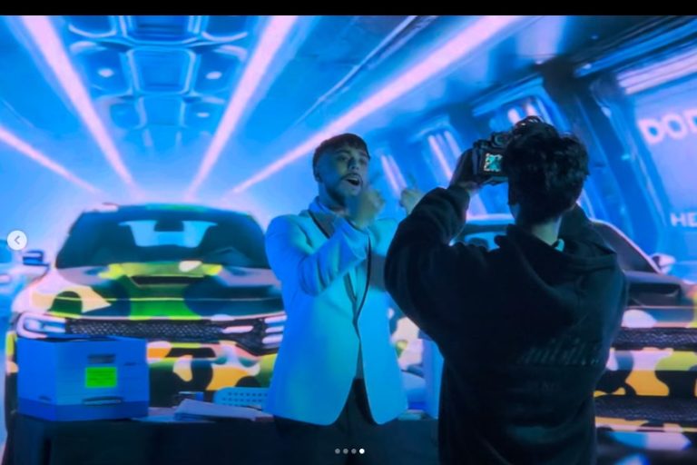 Crimson sky portrait look with artist and model center stage on LED wall