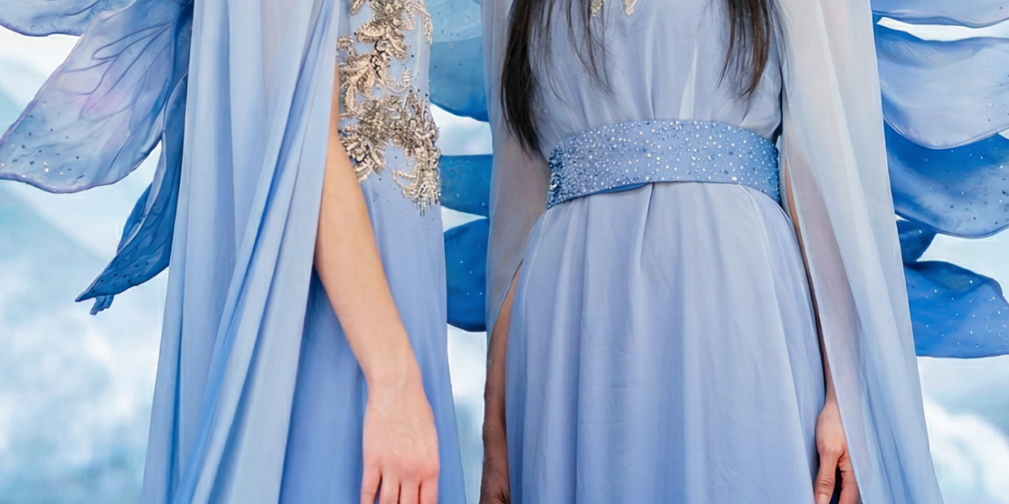 Two models in Xiangyan Couture blue New Chinese gowns with petal wings, misty mountain LED virtual production backdrop at Upperland Studio Vancouver