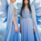Two models in Xiangyan Couture blue New Chinese gowns with petal wings, misty mountain LED virtual production backdrop at Upperland Studio Vancouver